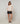 Oversized wollen trui met V-hals - Beige stoel