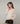 Oversized wollen trui met V-hals - Beige stoel