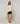 Oversized wollen trui met V-hals - Beige stoel